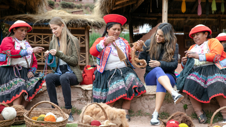 Peru Sacred Valley Ccaccaccollo Women’s Weaving Co-op Local Women Female Travellers Interacting.jpg