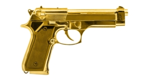Goldene Pistole Waffe Revolver Colt Foto iStock Patrick Boelens